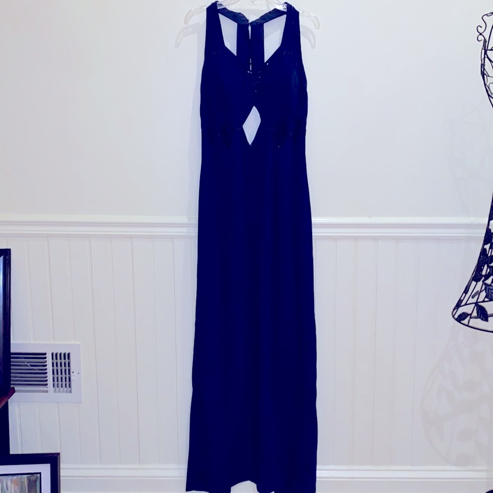 Jovani navy size 10 evening gown. Elegant beading around neck and cut out waist